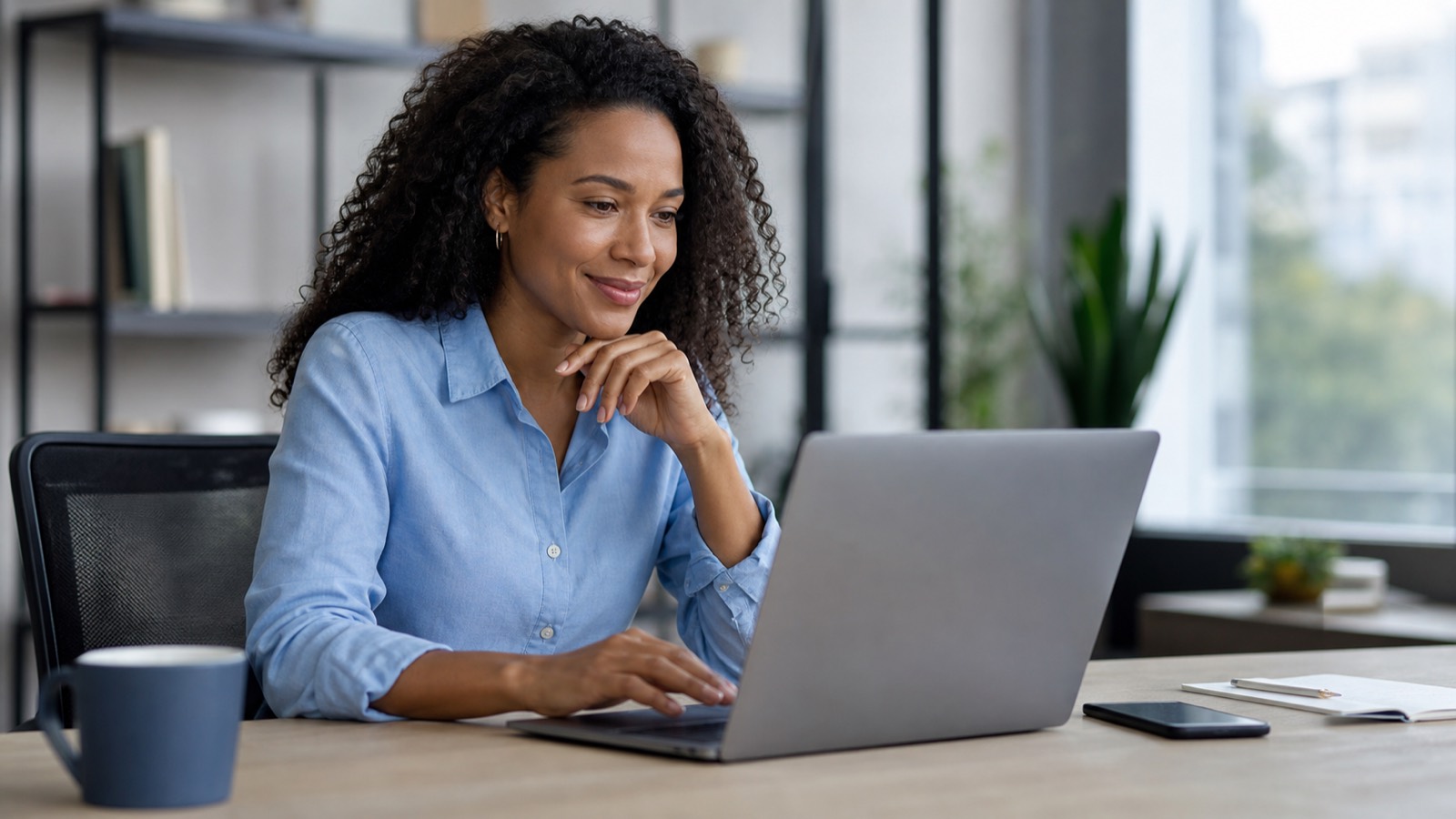 Job seeker using Leadify Jobs 2.0 in a modern workspace